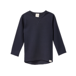 Navy organic merino wool long sleeve essential tee with crew neck and scooped hem.