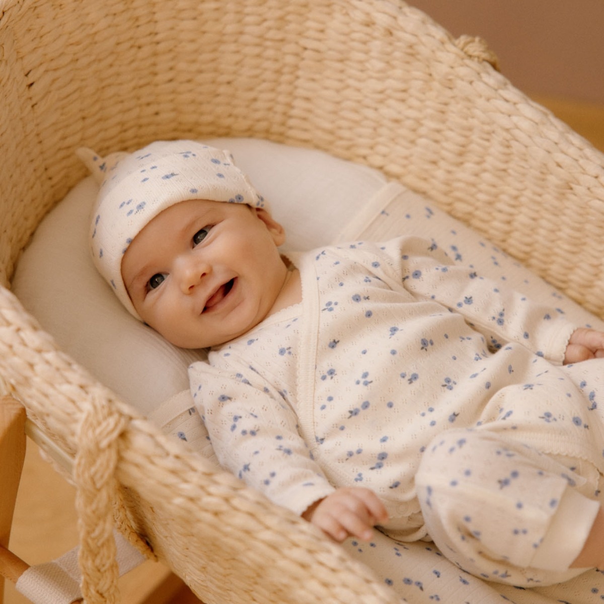 Newborn sleeping in moses basket best sale
